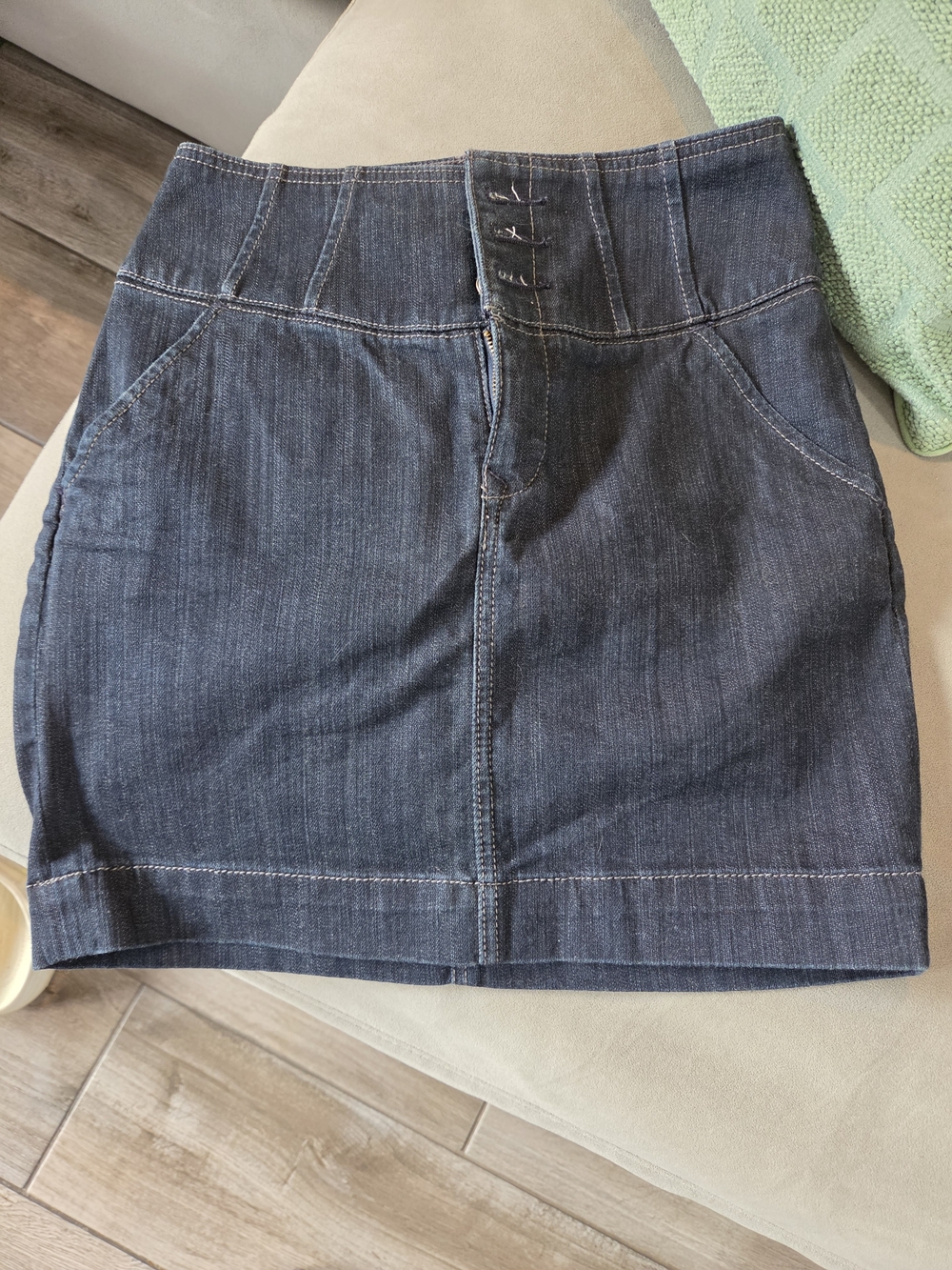 High-waisted, dark wash denim mini skirt Use It Only Once